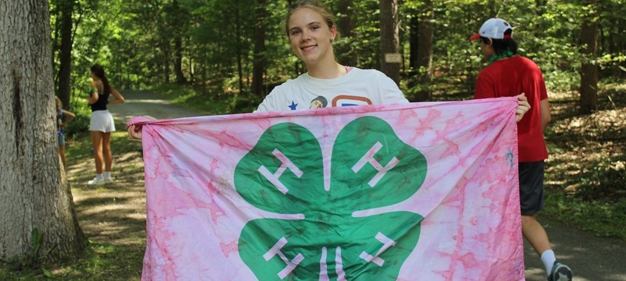 Camper with 4-H Flag
